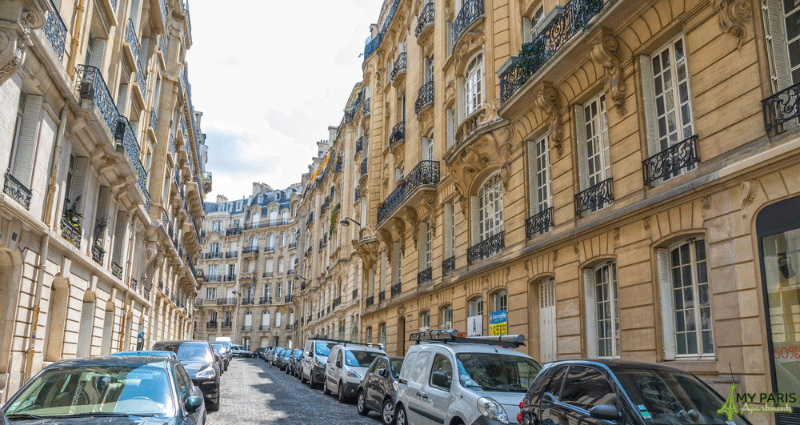beautiful Parisian street with ‘pierre de taille’ Hausmannian traditional buildings from the 19 century